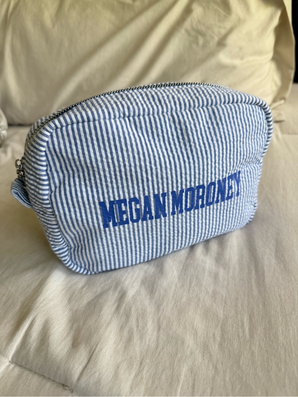 Megan Moroney blue + white striped pouch
